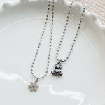 SG.365 // Surgical Steel Flat Cosmos Pendant , 1pc / 5-6535-07